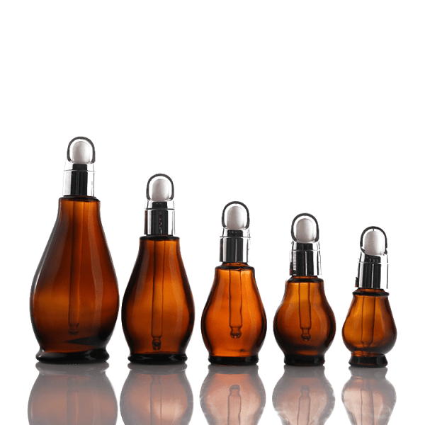 Empty glass bottles with glass dropper